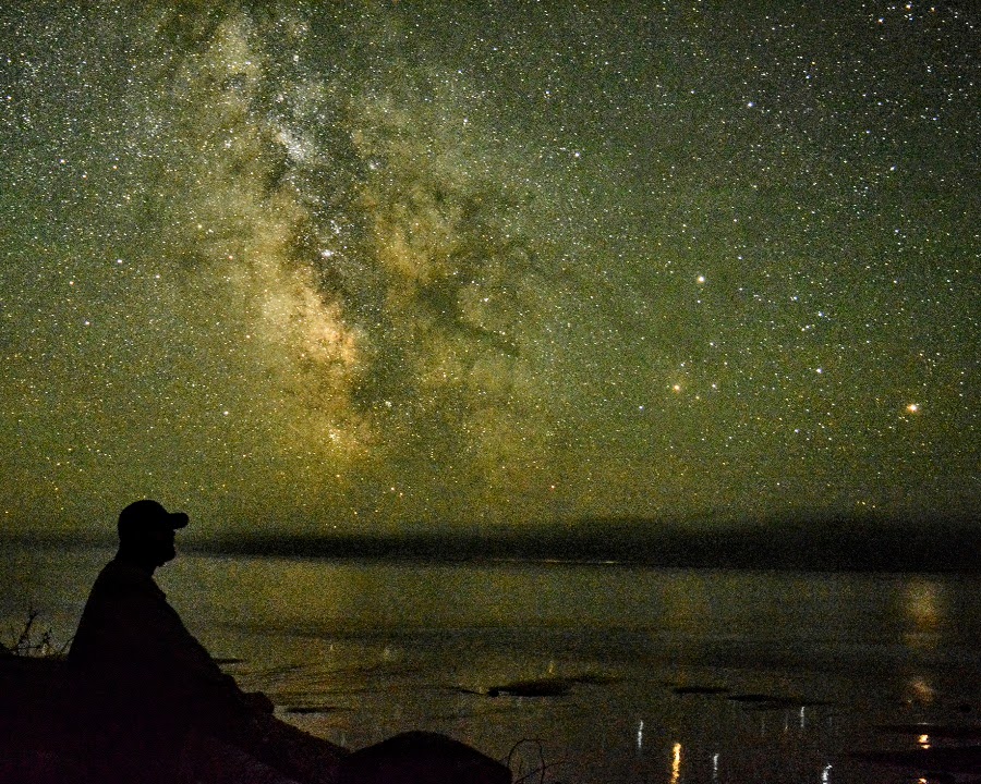 Eric and the magical reflection of the Milky Way on the beach while camping along the coastline of Olympic NP